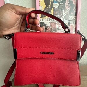 Calvin Klein Red Crossbody Bag with Flap Closure 👛